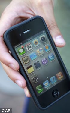 A new iPhone complete with black rubber 'bumper' which Apple 
claims will help solve the problem